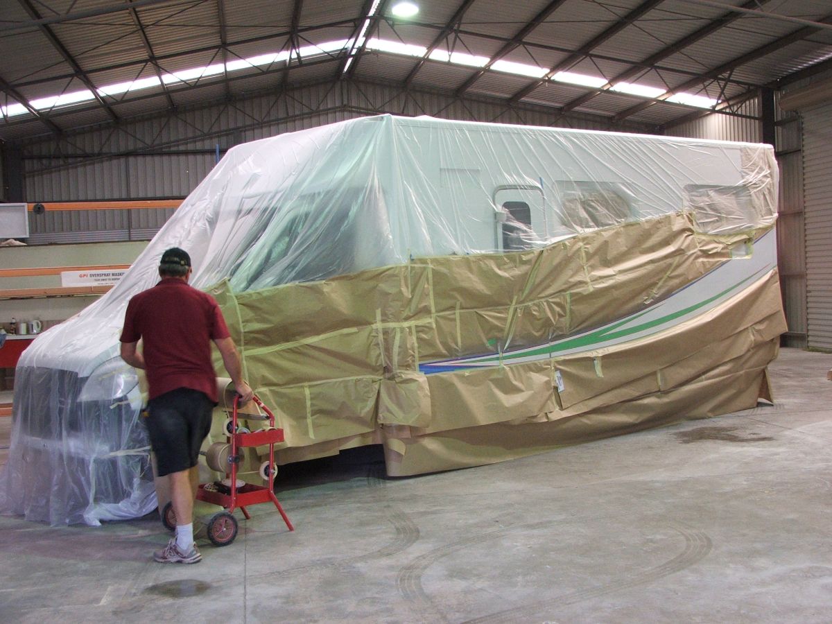 Older motorhome being painted in the factory